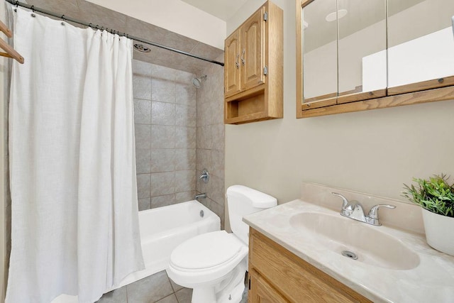 full bath featuring toilet, shower / bathtub combination with curtain, vanity, and tile patterned floors