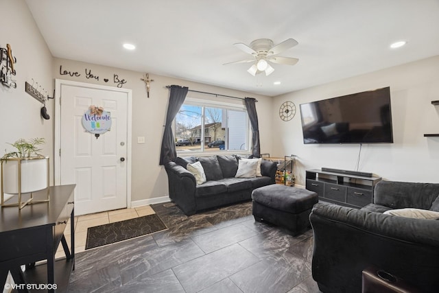 living room with recessed lighting, baseboards, and a ceiling fan