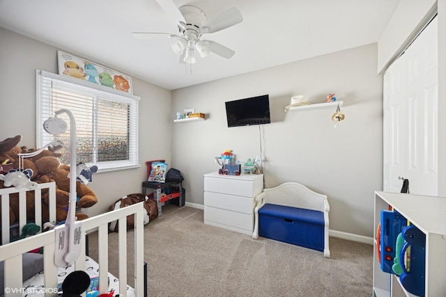 bedroom with baseboards, carpet, and ceiling fan