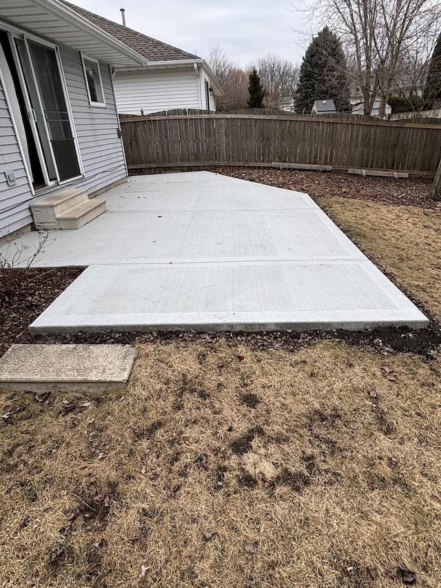 view of patio / terrace with entry steps and a fenced backyard