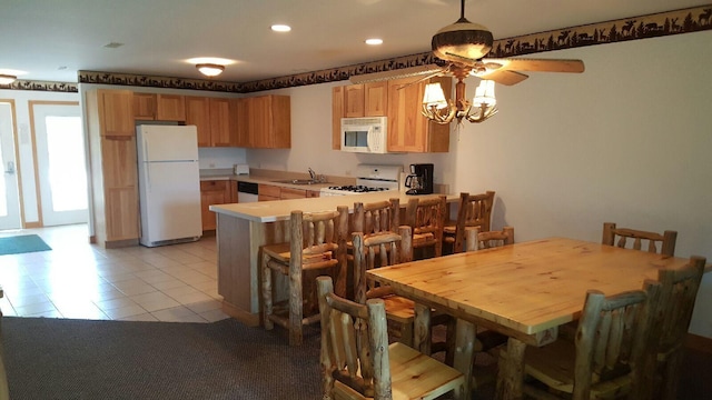 dining room featuring light tile patterned floors, ceiling fan, and recessed lighting