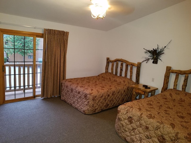 carpeted bedroom featuring access to outside