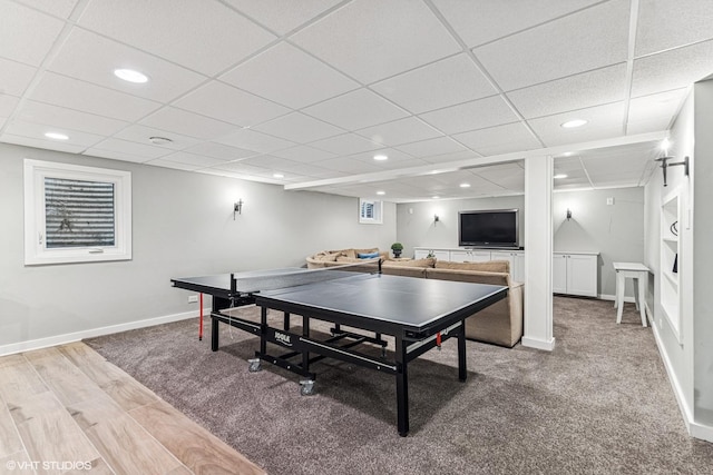 playroom with recessed lighting, a drop ceiling, and baseboards