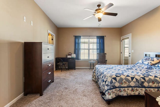 bedroom with light carpet, a ceiling fan, and baseboards