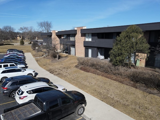 exterior space with uncovered parking