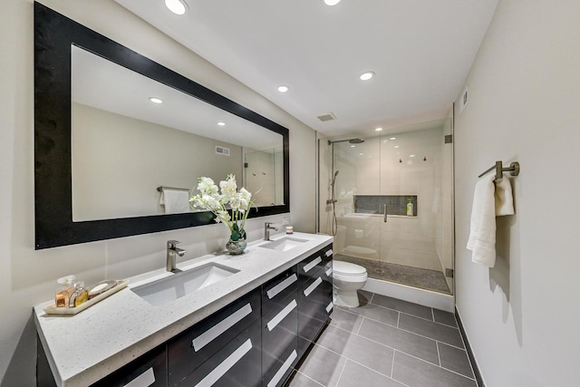 bathroom with a sink, visible vents, toilet, and a shower stall