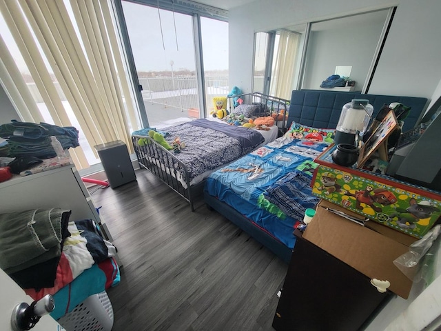 bedroom with wood finished floors