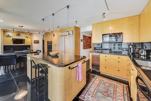 kitchen with dark tile patterned flooring, dark countertops, black appliances, pendant lighting, and backsplash