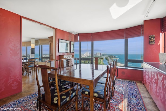 dining space with a water view