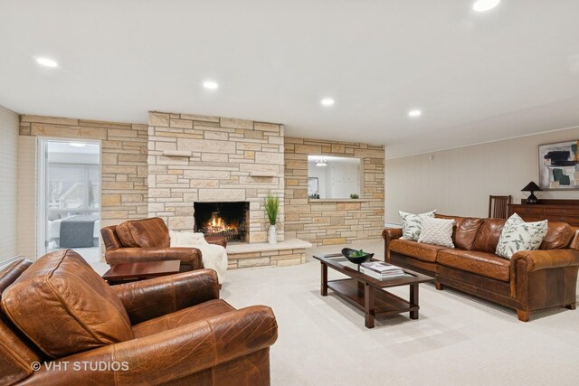 interior space featuring light carpet, a baseboard radiator, and beamed ceiling