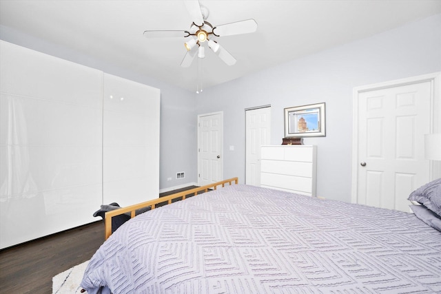 bedroom featuring wood finished floors and a ceiling fan