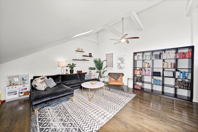 living room featuring lofted ceiling, wood finished floors, and a ceiling fan