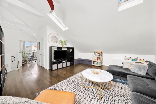 living room with lofted ceiling with skylight, baseboards, and wood finished floors