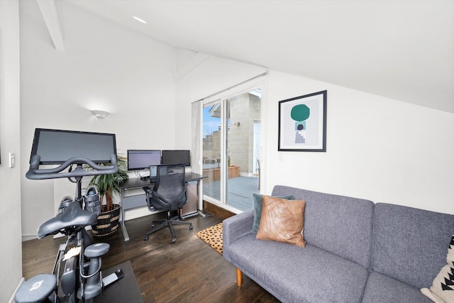 office with lofted ceiling and wood finished floors