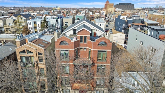 property's view of city with a residential view