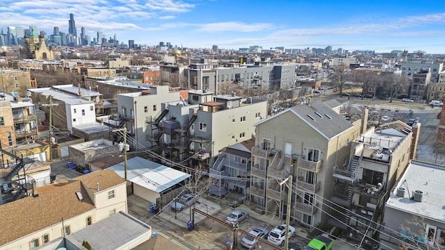 birds eye view of property featuring a view of city