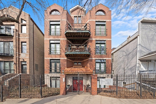 view of building exterior featuring fence