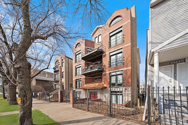 view of building exterior with fence