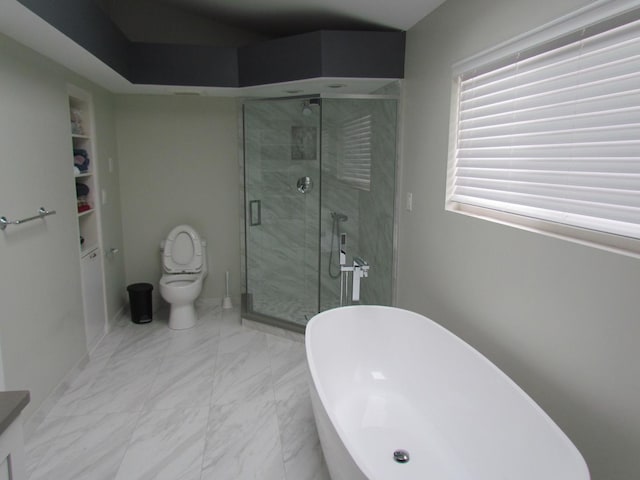 full bathroom with a stall shower, marble finish floor, a soaking tub, and toilet