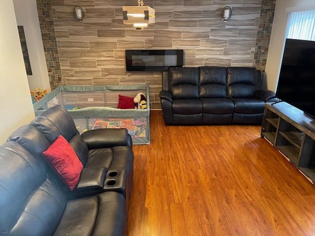 living area featuring wood finished floors