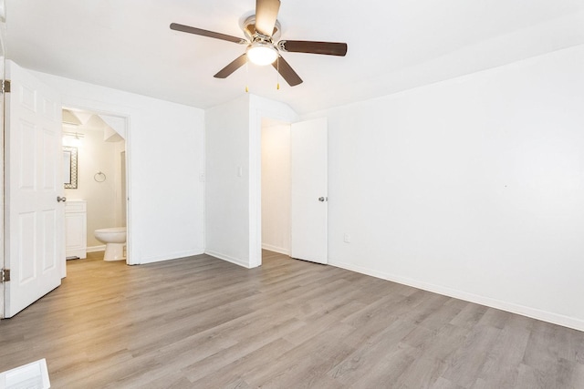 unfurnished bedroom with light wood-style floors, visible vents, and baseboards