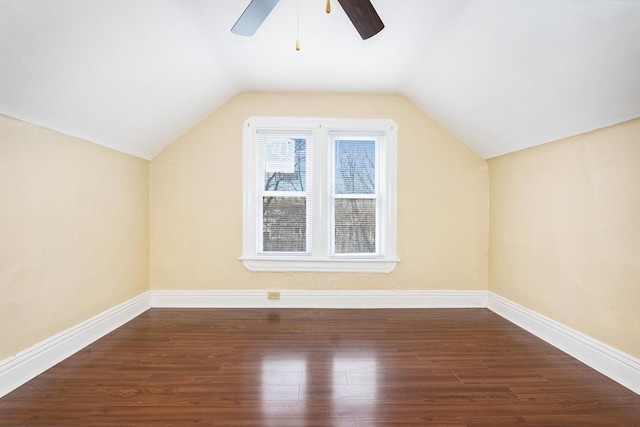 bonus room featuring lofted ceiling, ceiling fan, baseboards, and wood finished floors