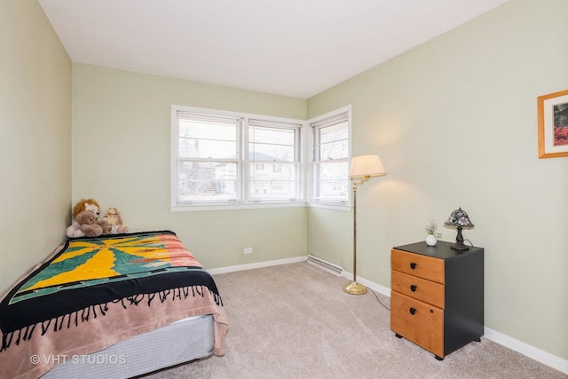 bedroom featuring baseboards and carpet floors