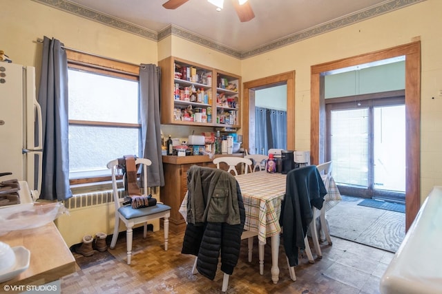 dining area with ceiling fan