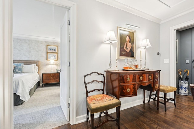 bathroom featuring wood finished floors, vanity, baseboards, ornamental molding, and ensuite bath