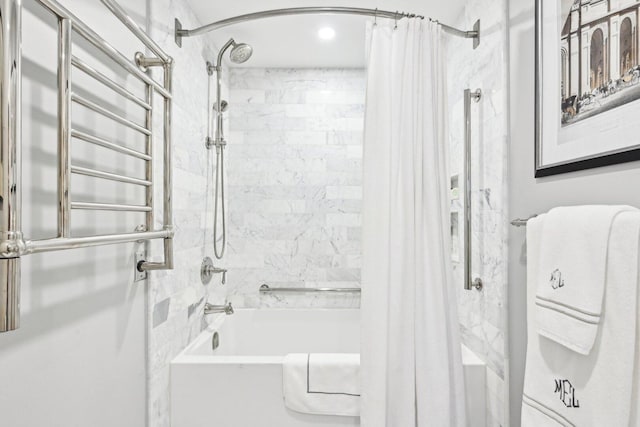 bathroom with shower / tub combo