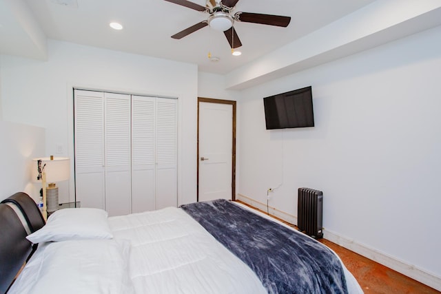 bedroom featuring recessed lighting, a closet, radiator heating unit, ceiling fan, and baseboards