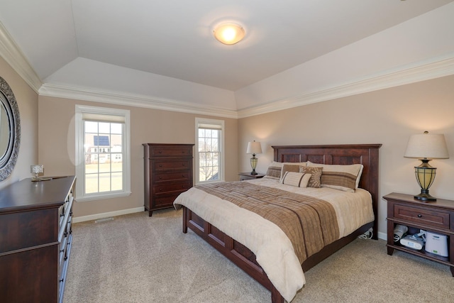 bedroom featuring baseboards, light colored carpet, crown molding, and vaulted ceiling