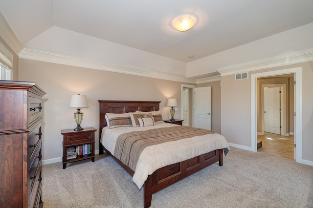 bedroom featuring light carpet, visible vents, and ornamental molding