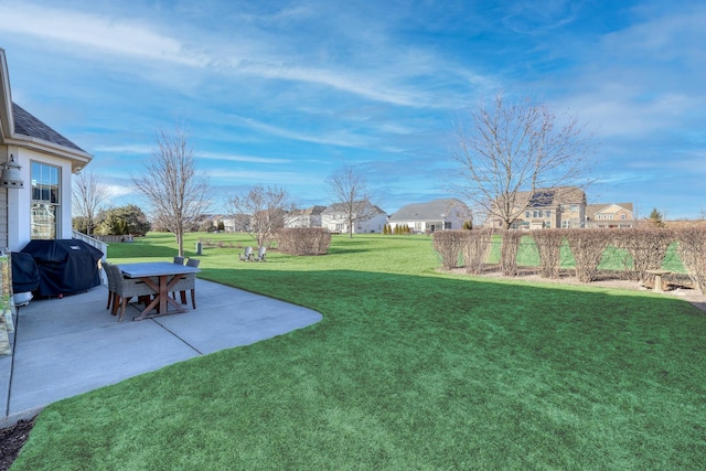 view of yard with a patio area