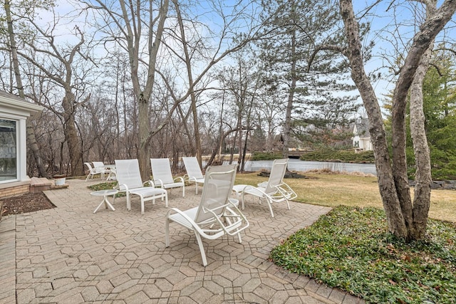 view of patio / terrace with a water view