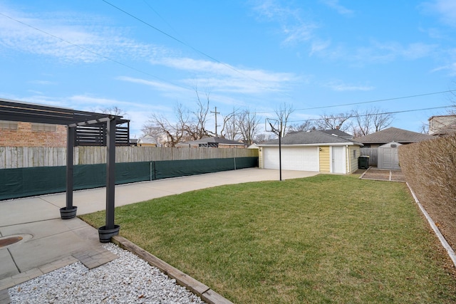 view of yard featuring a garage, a patio, fence, and a pergola