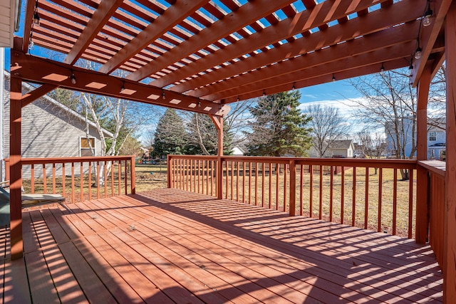 wooden terrace with a pergola