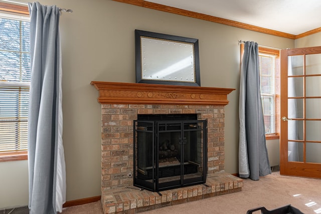 details featuring carpet, a fireplace, crown molding, visible vents, and baseboards