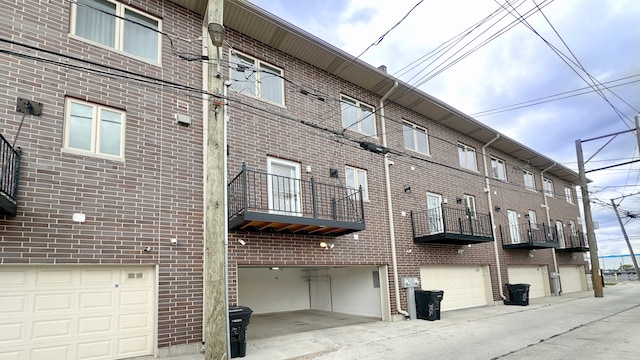 view of building exterior with an attached garage