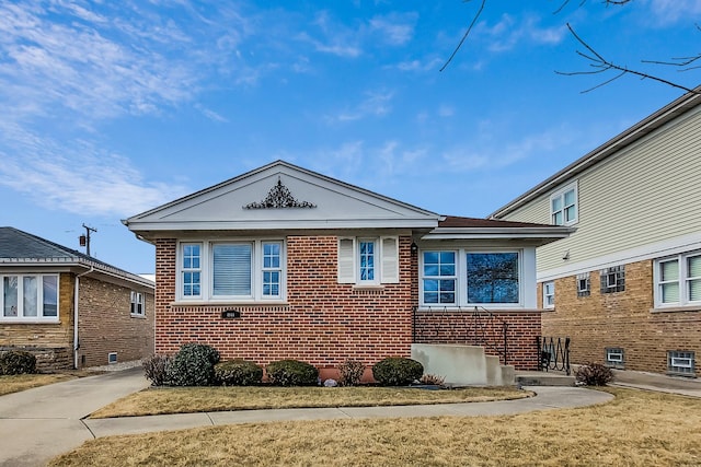 view of front of property featuring brick siding