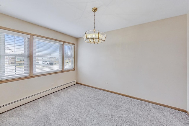 spare room with baseboards, a baseboard radiator, a chandelier, and light colored carpet