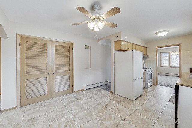 kitchen featuring white appliances, ceiling fan, under cabinet range hood, and a baseboard heating unit