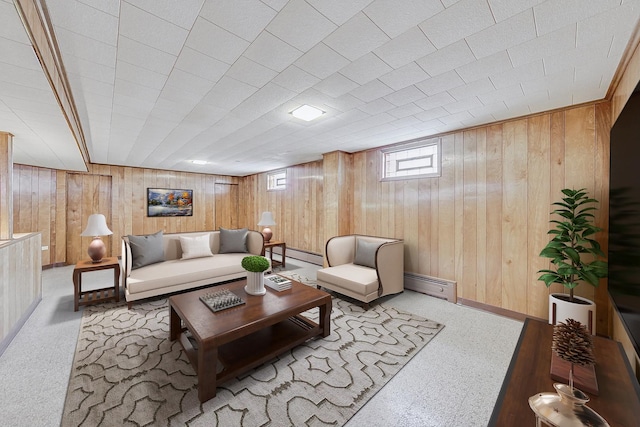 living area with carpet floors, a baseboard radiator, and wooden walls