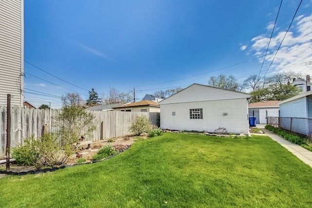 exterior space with a fenced backyard