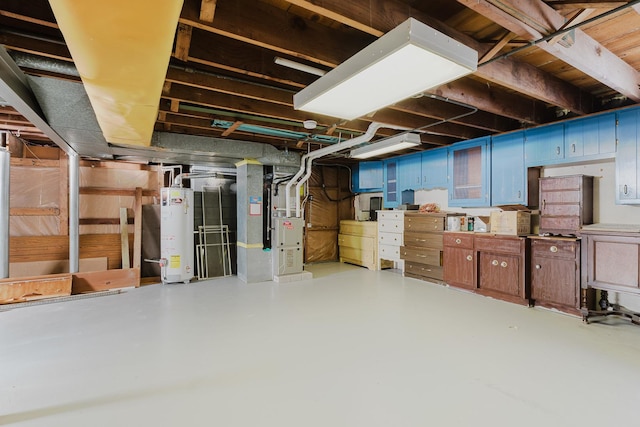 unfinished basement featuring water heater and heating unit