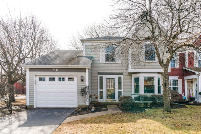 view of front of house featuring a garage and driveway