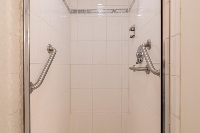 room details with a tile shower