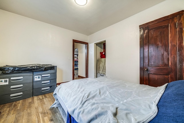 bedroom featuring wood finished floors