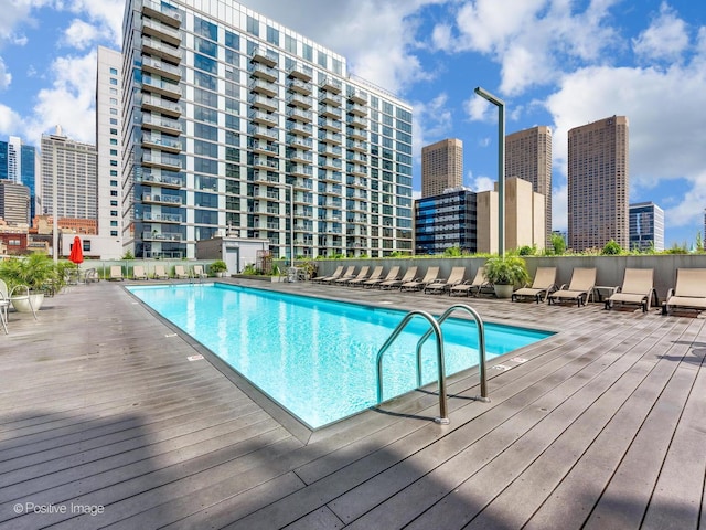 community pool with a city view