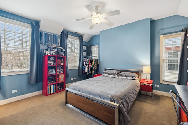 bedroom featuring vaulted ceiling, carpet floors, a ceiling fan, and baseboards